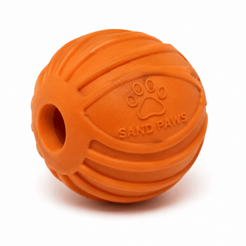 Orange rubber ball with 'Sand Paws' branding on a white background